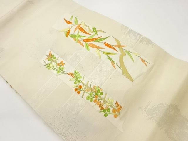 短冊に笹の葉・草花模様織出し名古屋帯